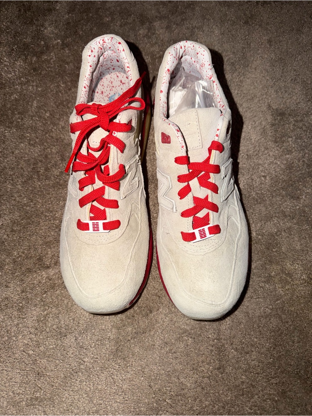Brand New Balance White Suede Sneakers with Red Laces and Red Accents
